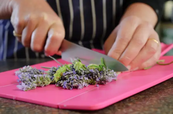 How to make lavender bath oil - chopping the flowers