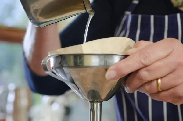 How to make lavender bath oil - straining the mixture