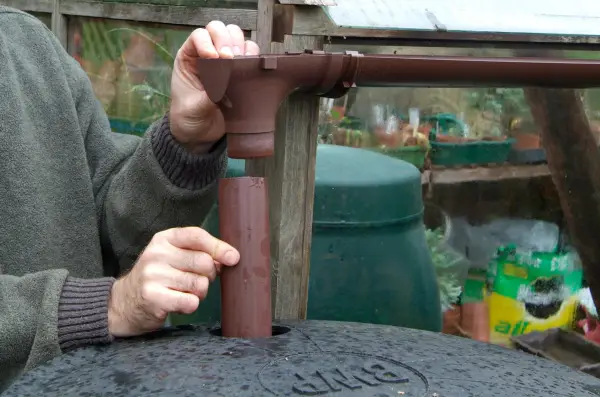 Fitting the downpipe to the guttering