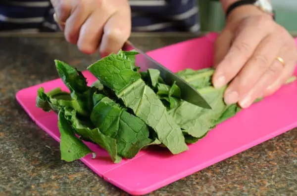 How to make comfrey ointment - chopping the leaves