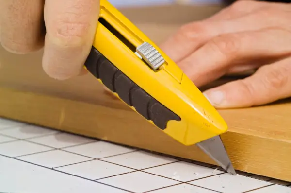 Cutting the acrylic sheet to make a door