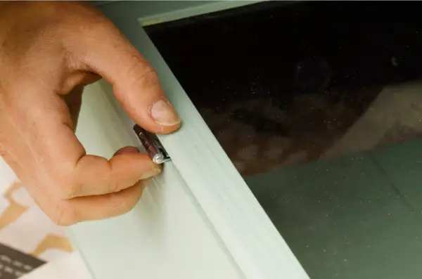 Attaching hinges to the door