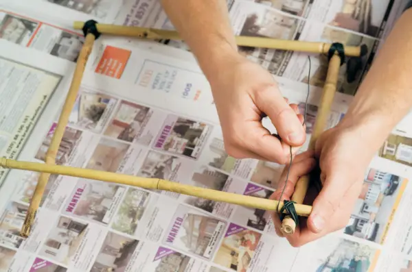 Make your own plant supports - writing the bamboo together