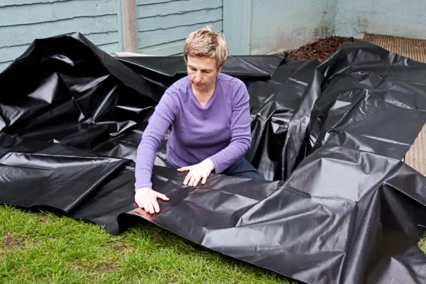 How to build a garden pond - adding pond liner