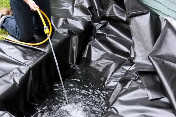 How to build a garden pond - filling the pond with water