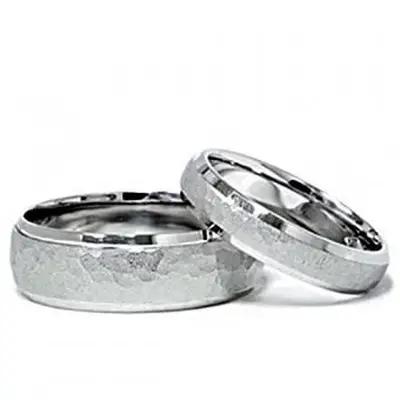 https://cf.ltkcdn.net/engagementrings/images/slide/186381-500x500-hammered-wedding-bands.webp