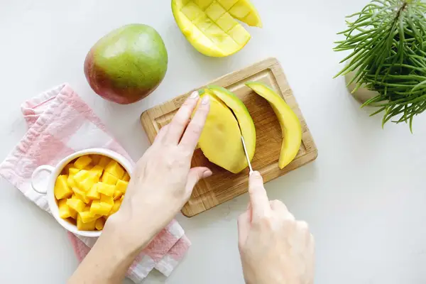 cutting a mango