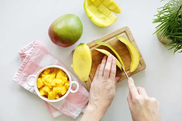 cutting a mango