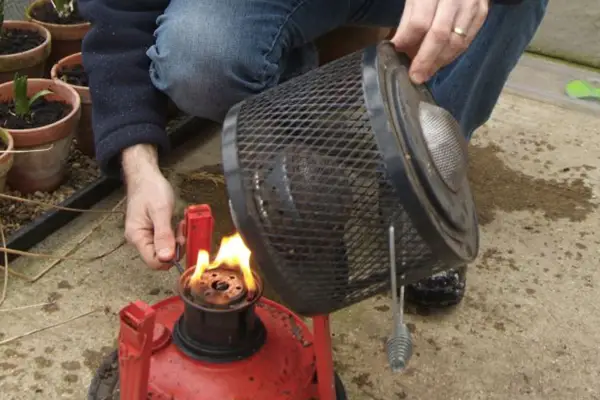 Protecting plants in winter - lighting a paraffin heater