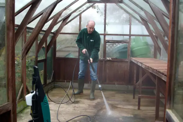 Washing the greenhouse floor