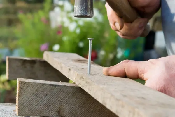 How to make a strawberry bed - nailing the planks together
