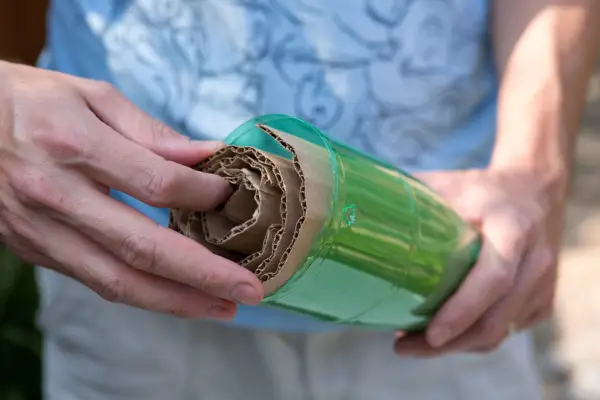 Adding in the roll of cardboard