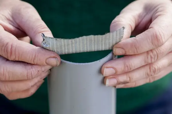 Adding Gaffa tape to the end of guttering