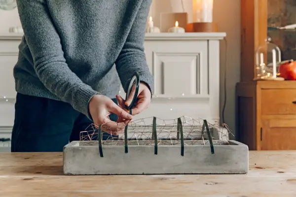 How to make a table decoration for Christmas - taping down the chicken wire