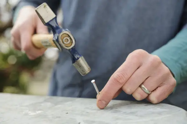 Adding drainage holes to the container