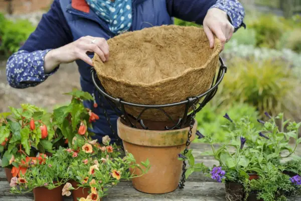 Adding coir to the basket