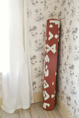 How to Uncurl a New Rug