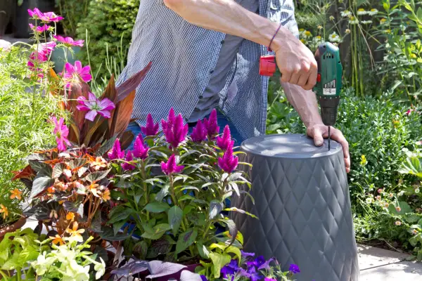 Drilling holes in the base of the container
