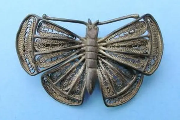 Broche papillon vintage en étain