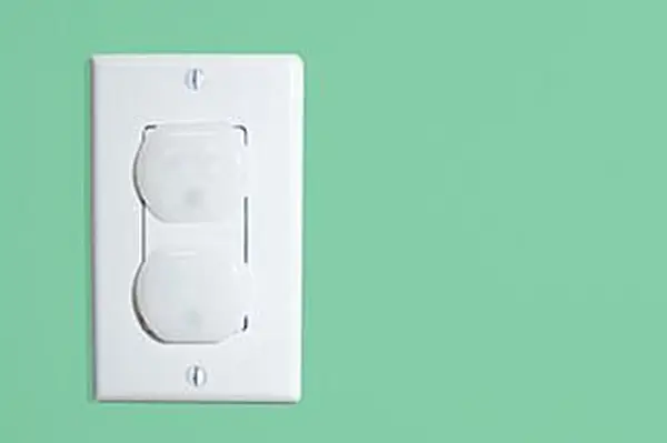 tampas de tomada infantil