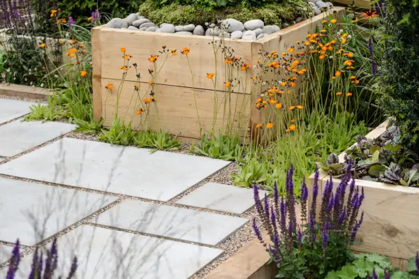 Wooden raised beds filled to the brim
