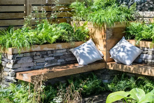 Wooden corner bench with planter