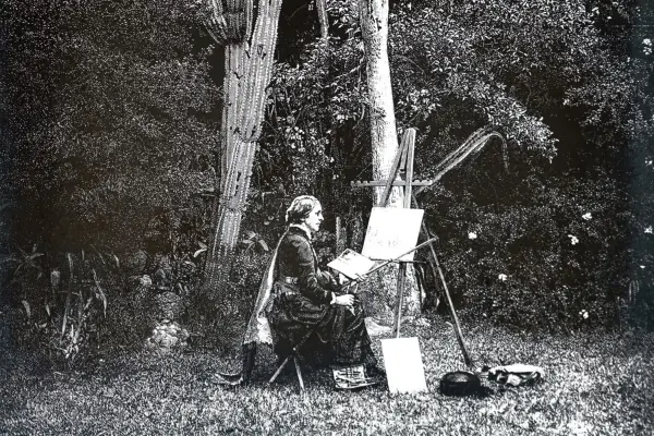 An engraving depicting Marianne North painting flowers in South Africa, 1883. Getty images.