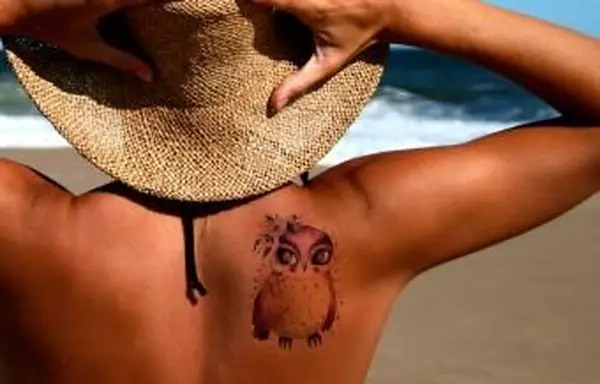 תמונה של קעקוע בצבעי מים של ינשוף