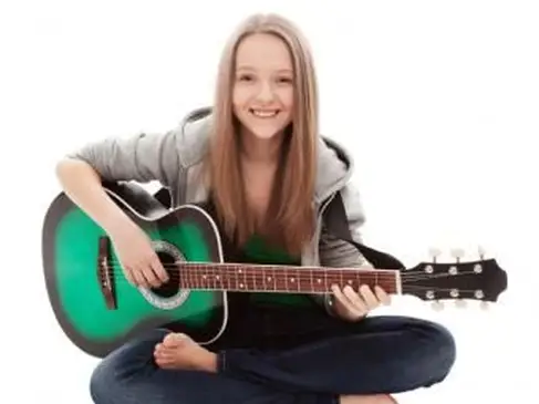 https://cf.ltkcdn.net/teens/images/slide/166053-764x628-girl-with-guitar.webp