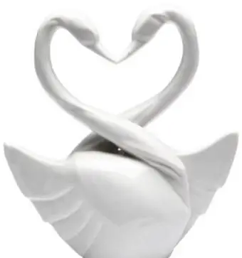 https://cf.ltkcdn.net/weddings/images/slide/174968-399x450-swan-hearts.webp