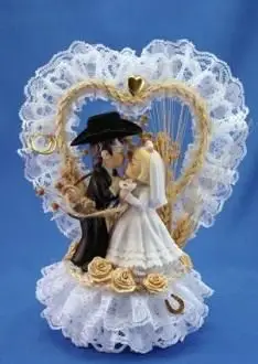 https://cf.ltkcdn.net/weddings/images/slide/174966-234x350-western-heart-topper.webp