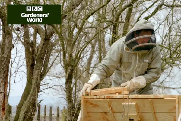 Monty Don inspecting a beehive