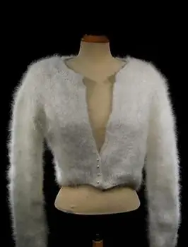 Haussement d'épaules de la princesse Kate Angora